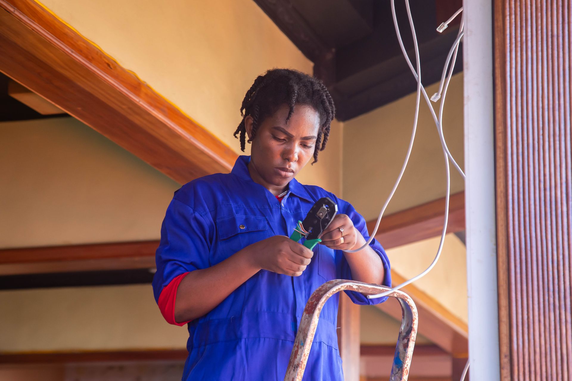 vendor wiring a low voltage system in a house or commercial building